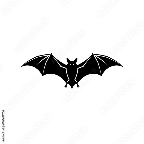 Bat silhouette flying with wings spread wide for spooky theme
