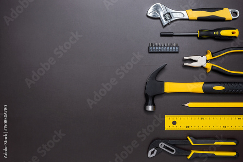 Set of hand tools on a dark background