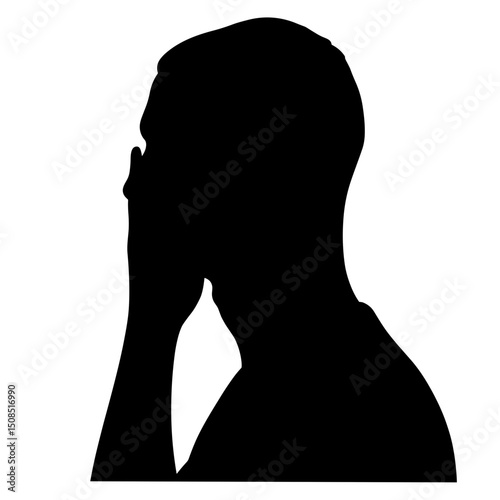 Silhouette of a man covering his face in a contemplative pose  