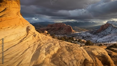 Dramatic Contrast of Snow and Sandstone in Desert Mountains

