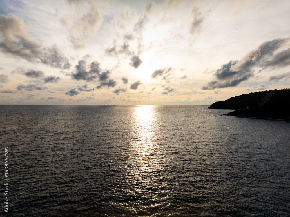 Fototapeta premium Aerial view sunset sky,Nature beautiful light Sunset or sunrise over sea,Colorful scenery sunset sky background,Amazing clouds and waves in sunrise sky nature light cloud background.