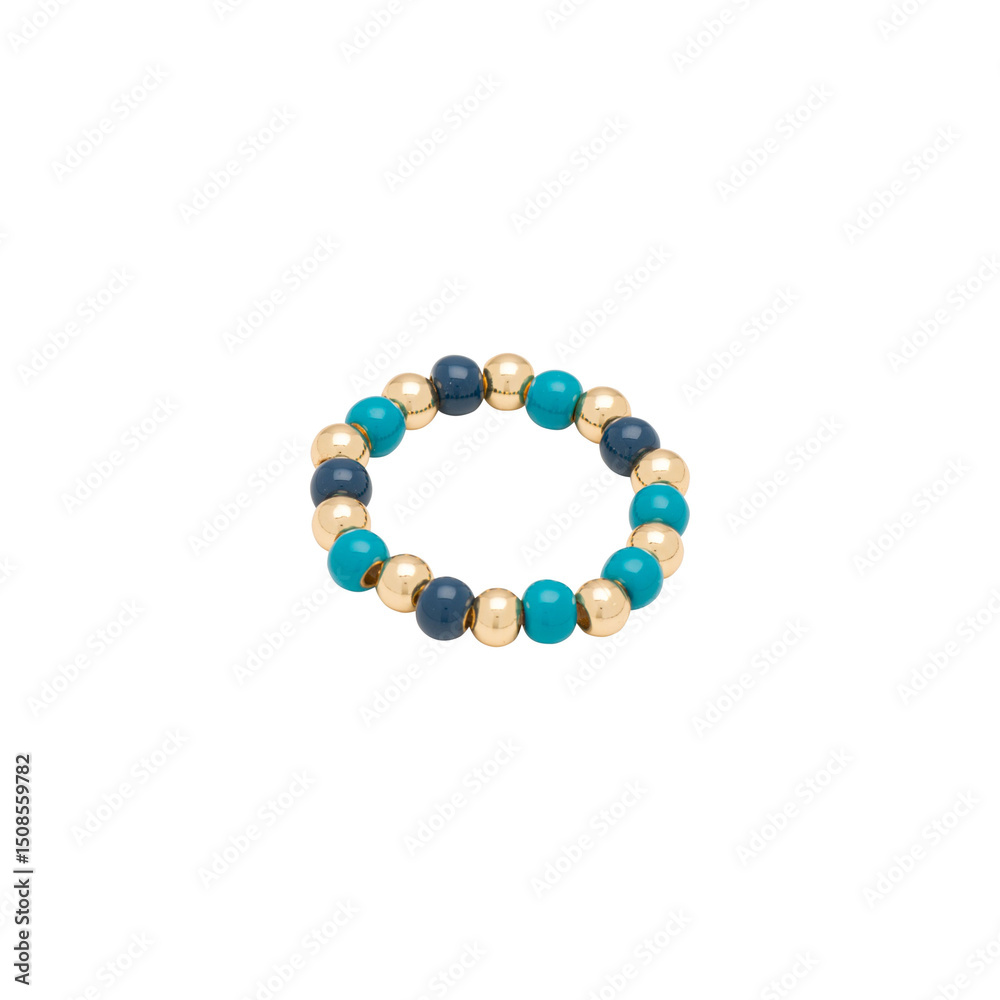 Fototapeta premium Stretch ring made with gold turquoise and navy blue beads on white background. Please see some similar pictures from my portfolio