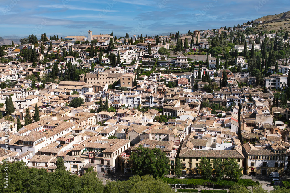 Fototapeta premium Panoramic view of the famous old quarter of the Albaicin, built by the Arabs in the city of Granada.