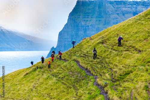 Trekkers on Kalsoy Island - Faroe Islands
