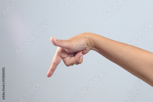 Pointing down hand gesture often used for emphasis or warning signal