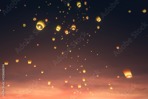 sky lanterns in sunset ligh...