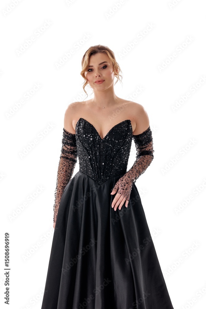 Elegant woman in a stunning black gown showcases sophisticated fashion at a photoshoot Elegant woman in a stunning black gown showcases sophisticated fashion at a photoshoot