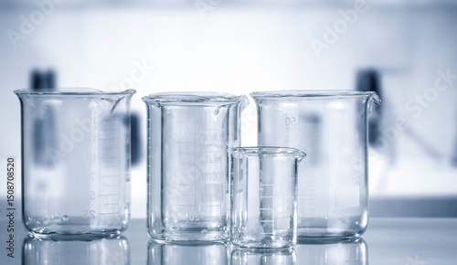 Foto Laboratory Glassware with Test Tubes – Medical Office Background