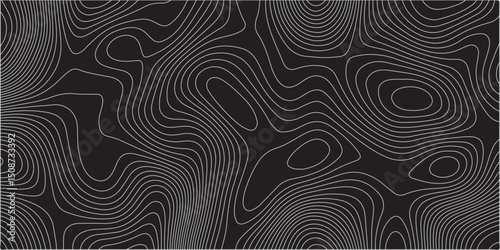  A detailed topographic map pattern featuring thin gray contour lines on a solid black background, indicating varying elevations of a landscape.