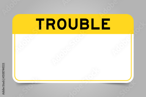 Label banner that have yellow headline with word trouble and white copy space, on gray background
