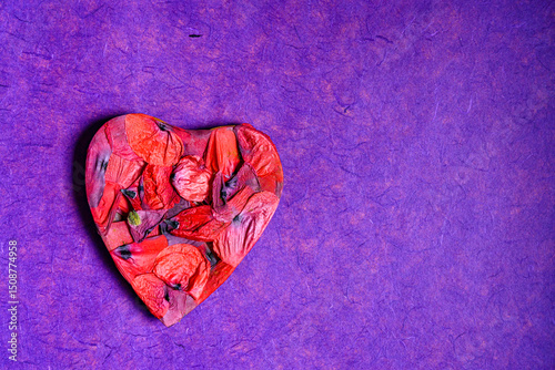 red heart on paper background