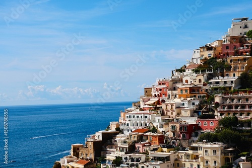 View of Positano village, colourful houses and blue sea on Amalfi Coast in Campania, Italy.