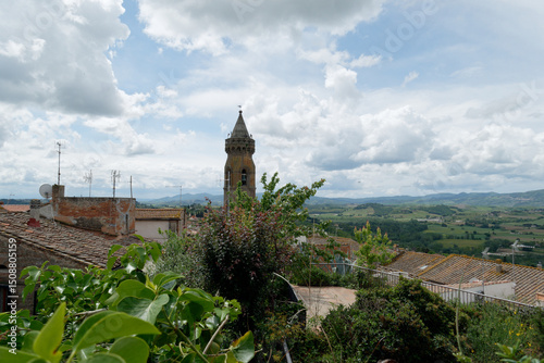 View of Peccioli bell tower and surrounding countryside . Pisa, Tuscany Italy
