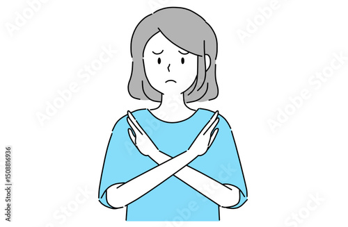 胸の前で腕を交差してバツ印を作っている若い女性