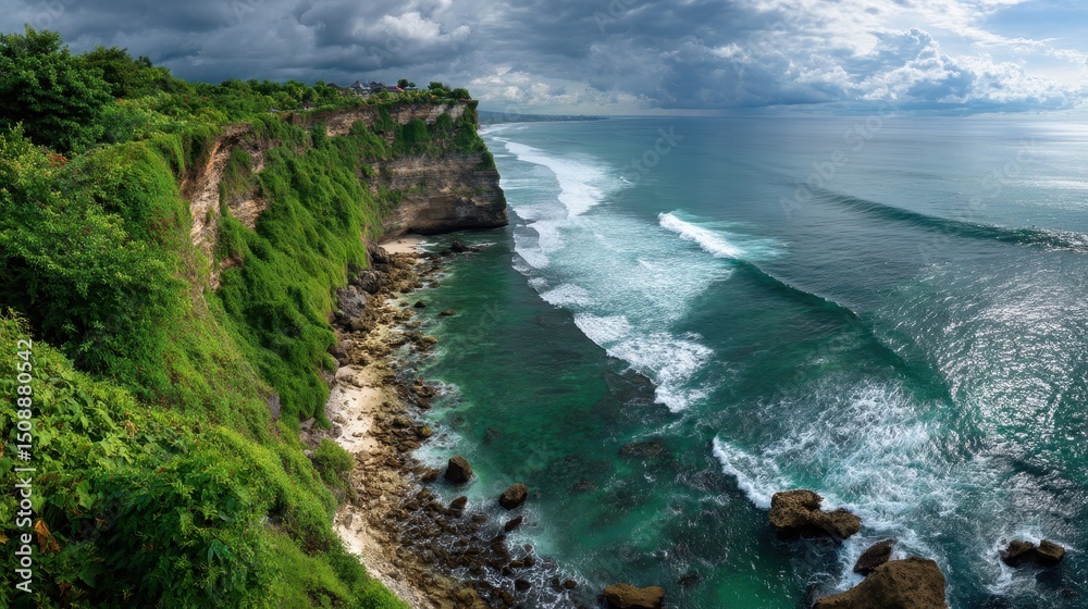 Obraz premium Dramatic coastal cliffs meet the ocean waves.