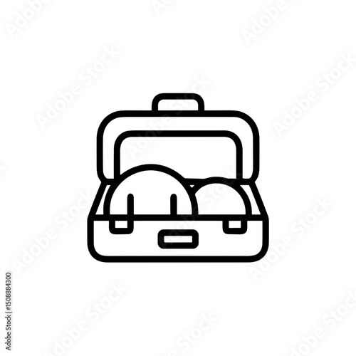 Open suitcase with summer clothing ready for vacation travel  