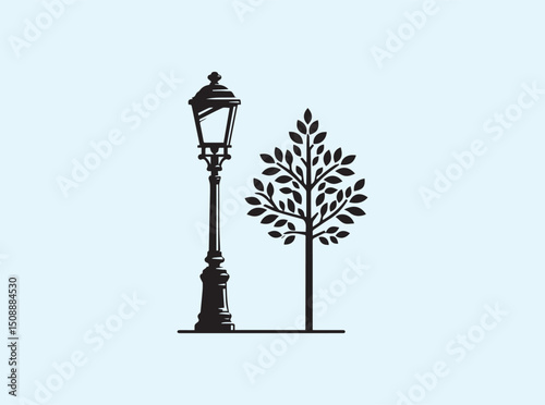Tree with Green Foliage Next to Street Light