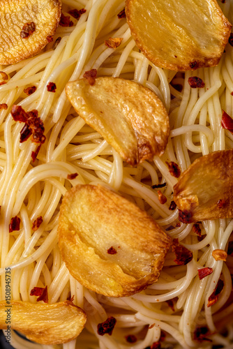 Spaghetti pasta with fried garlic and olive oil