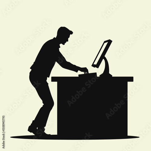 Silhouette of a man searching for information at a table with a computer monitor