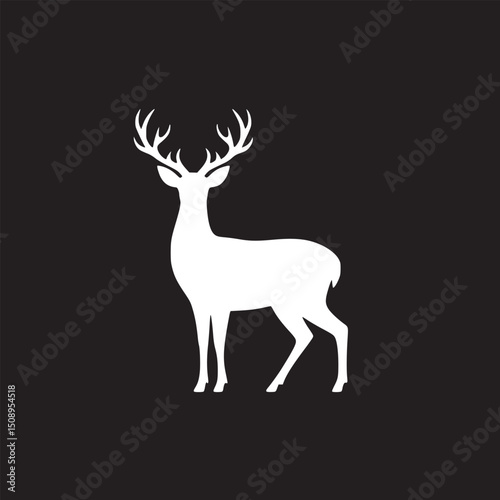 Fotografie A stark white deer silhouette stands against a solid black background in a minim