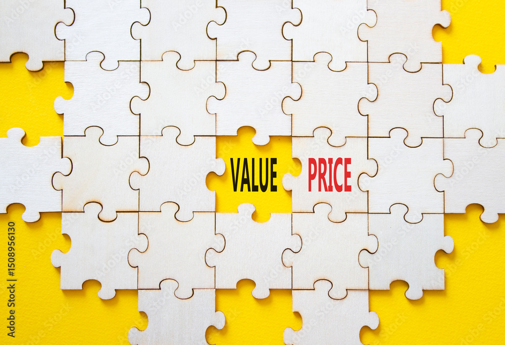 Obraz premium Price and Value symbol. Concept word Price and Value on wooden puzzle. Beautiful yellow background. Business and Price and Value concept. Copy space