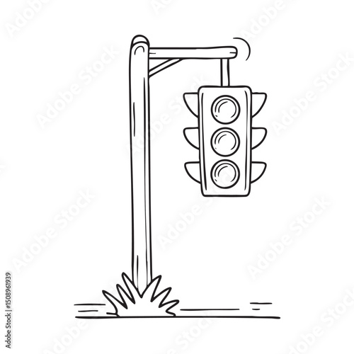 A traffic light hanging near a signpost