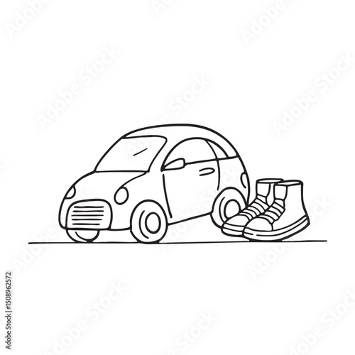 A small toy car lying beside a pair of shoes on the floor