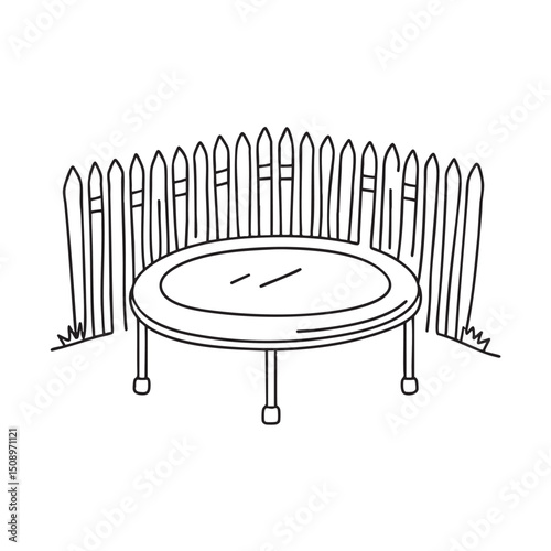 A trampoline behind a wooden fence