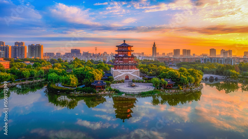 Sunrise aerial photography of Wangmu Pavilion in Nanchi Park, Jining, Shandong, China