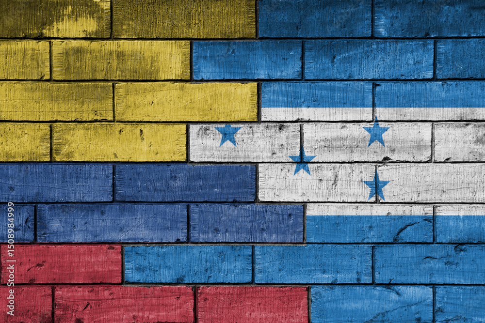 Fototapeta premium colourful painted big national flag of honduras and flag of colombia on a massive old brick wall background. concept