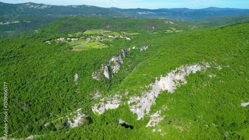 Drone view of Buzetski canyon on the Seven Waterfalls Trail near Buzet and Selca, Istria. Deep gorge, lush forest, river, and scenic hiking paths in pristine Croatian nature