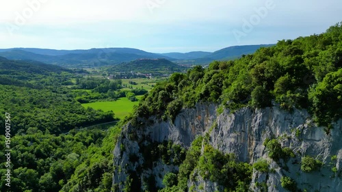 Drone view of Buzetski canyon on the Seven Waterfalls Trail near Buzet and Selca, Istria. Deep gorge, lush forest, river, and scenic hiking paths in pristine Croatian nature