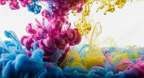 Vibrant pink, blue, and yellow ink plumes swirl and spread through clear water against a white background, creating abstract, organic shapes