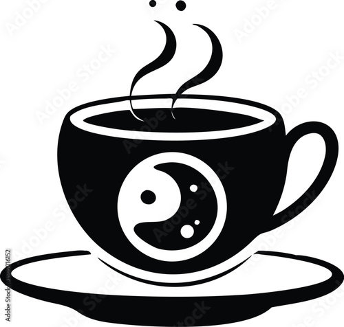 Steaming black coffee cup displays a yin yang symbol sitting on a saucer isolated