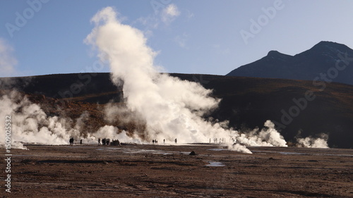 Morning mist and steam rise from Geyser del Tatio in Chile, a high-altitude geothermal field in the Atacama Desert