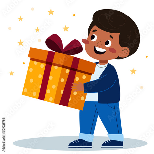 Dark-skinned boy holding big gift box with smiling expression. Young child receiving birthday present. Happy Kid on celebration party.
