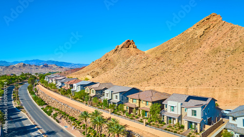 Aerial Fly Over Desert Suburban Homes and Mountain Ridge Lake Las Vegas
