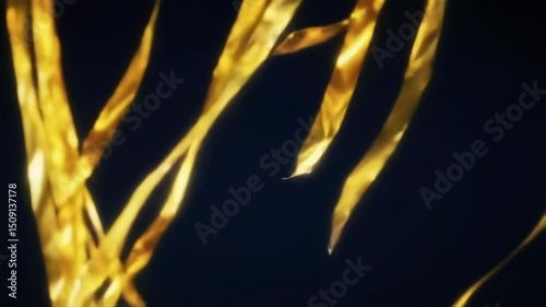 Abstract gold ribbons on a dark background