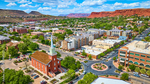 Fotografie Aerial Historic Red Brick Church Downtown St George Utah with Red Rock Mesas