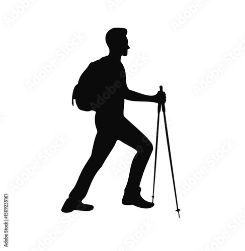 Silhouette of a hiker with backpack and trekking poles