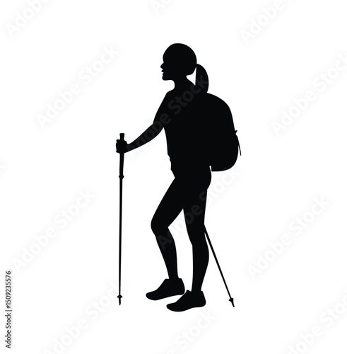 Woman hiker silhouette with backpack and trekking poles