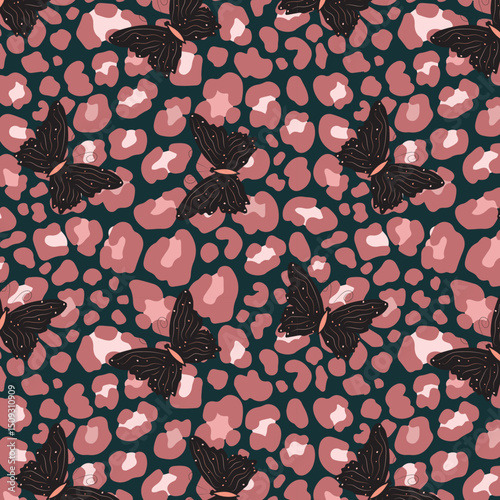 Seamless pattern of leopard skin and butterflies, vector illustration for fabric, fashion, background and wallpaper designs