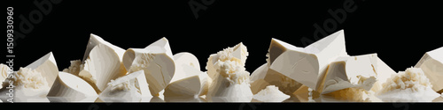 Chunks of Fresh Tofu - Creamy White Tofu Pieces Against Black Backdrop - Delicious Vegan Protein Source - High Resolution Food Photography - Culinary Ingredient Close Up