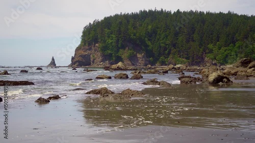 La Push Third Beach reveals coastal rocks and sea stacks along the Olympic Peninsula in Washington State. 4K UHD video.