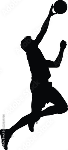 Basketball player silhouette jumping for a slam dunk in action pose

