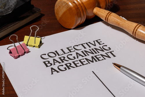 Union-Employer Contract Document on Desk – Legal Framework of Collective Bargaining Process