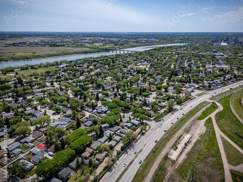 Fototapeta Naklejka Na Ścianę i Meble -  City view from above with a river running through it