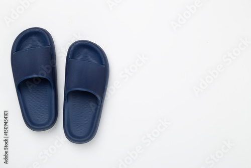 Blue sandals on color background,top view