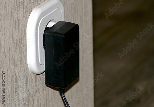 The charger is plugged into the outlet.
