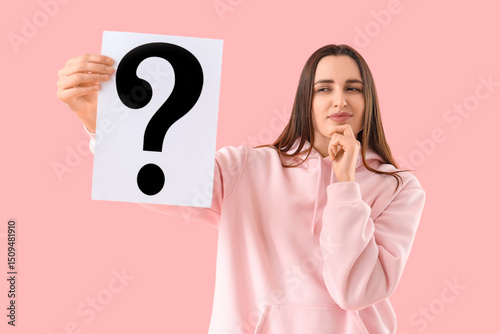 Thoughtful young woman with...